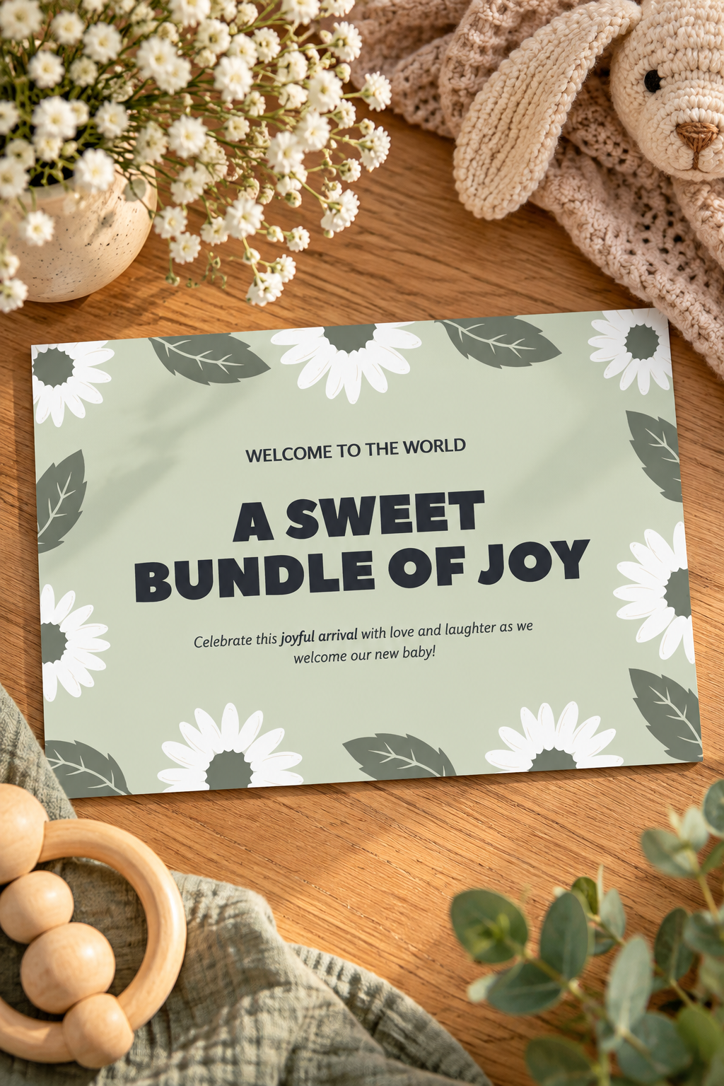 Pastel Green Minimalist Welcome Baby Template with decorative flowers and mint leaves.