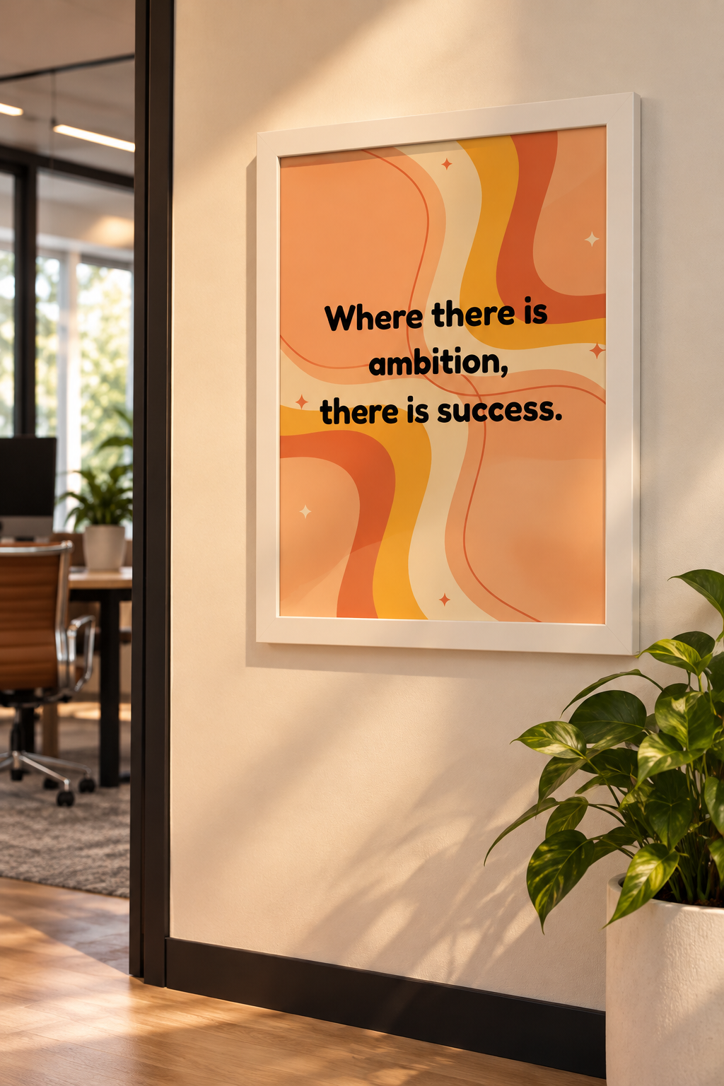Framed motivational wall art with orange retro waves and the quote “Where there is ambition, there is success.”