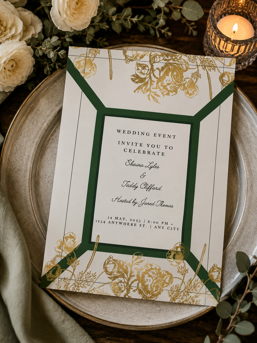 A modern geometric wedding invitation featuring an emerald green panel border and shiny gold metallic line art flowers.