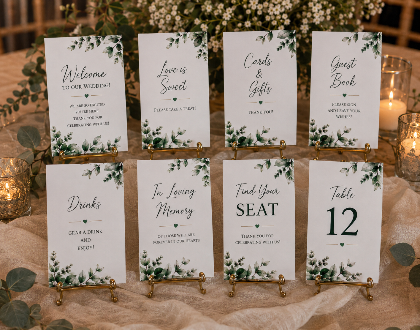 Eucalyptus wedding reception signs bundle including a dessert table sign, guest book print, and table numbers.
